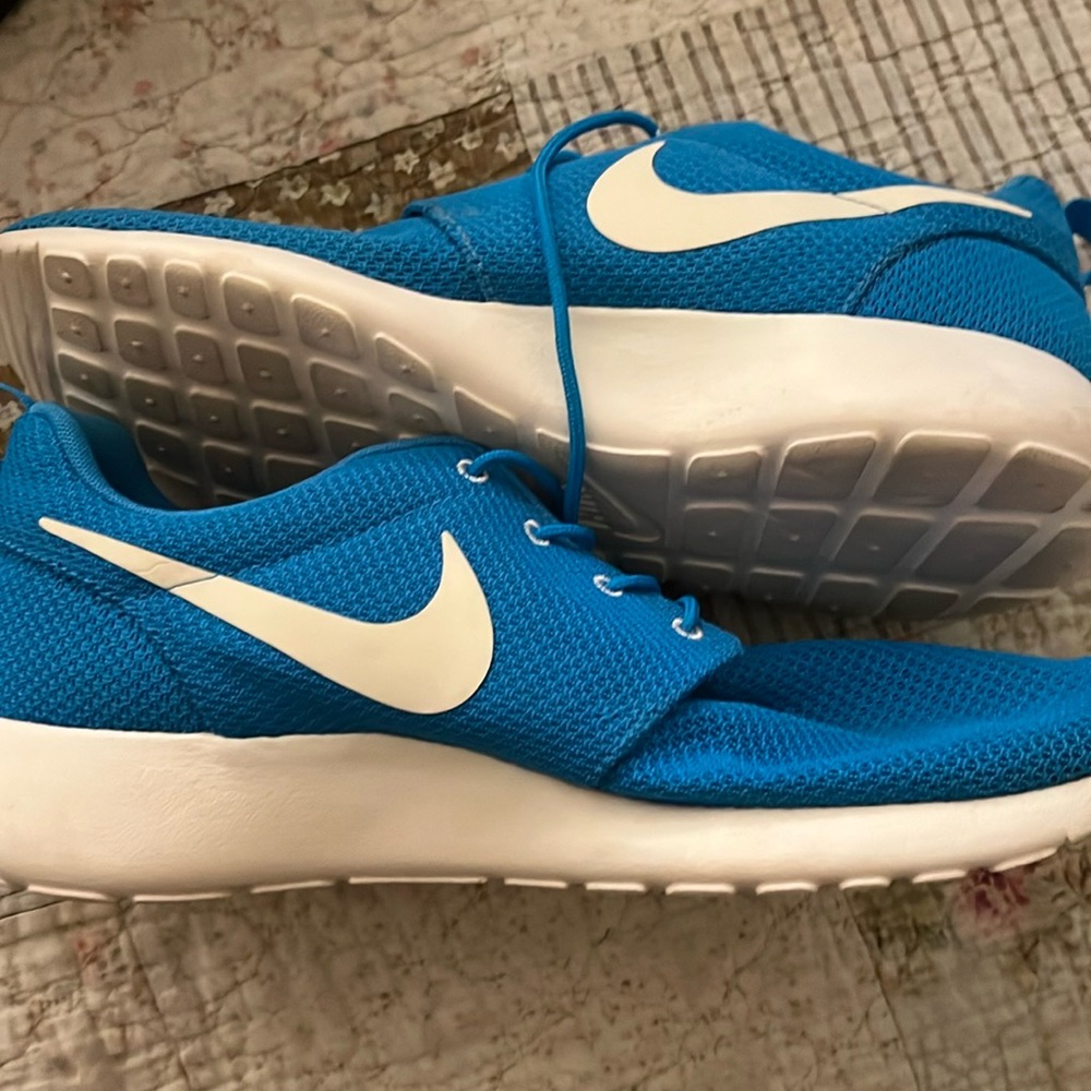 Nike Blue Sneakers  /only been worn 
Once